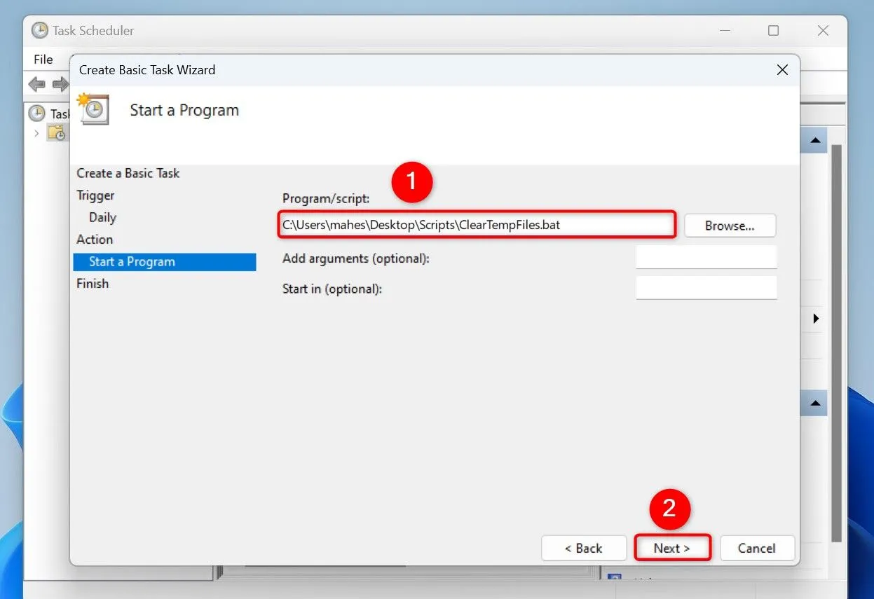 Chỉ định đường dẫn đến file script ClearTempFiles.bat trong Task Scheduler.