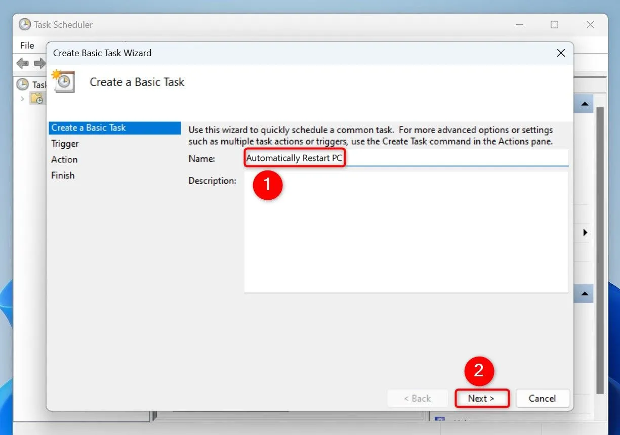 Giao diện đặt tên và mô tả cho tác vụ tự động khởi động lại trong Task Scheduler Windows 11