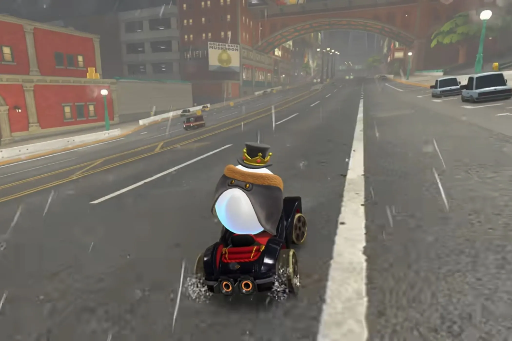 King Boo đua xe qua đường đua Crown City trong Mario Kart World giữa khung cảnh thành phố và hiệu ứng mưa