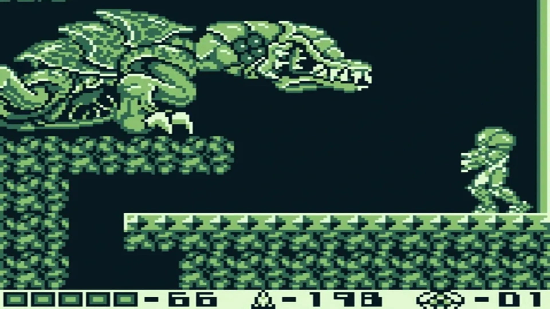 Ảnh chụp màn hình gameplay Metroid II: Return of Samus trên Game Boy, với đồ họa đơn sắc đặc trưng và Samus Aran.