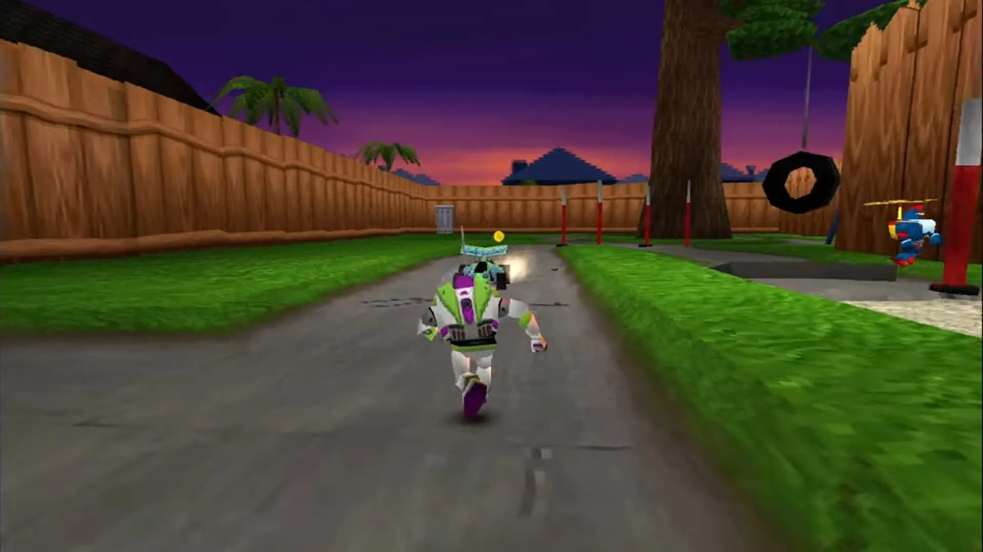 Buzz Lightyear chạy về phía chiếc xe RC trong khu vực Neighborhood của game Toy Story 2: Buzz Lightyear to the Rescue