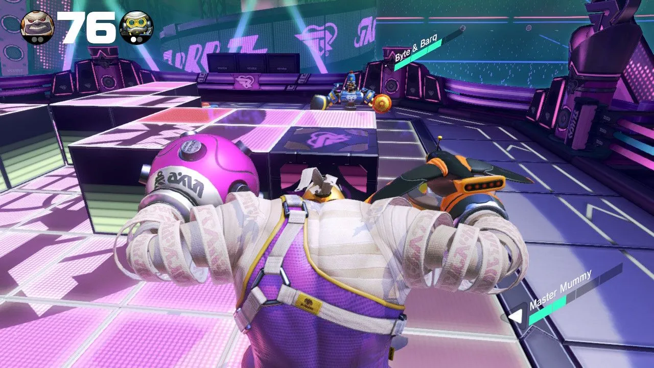 Cảnh chiến đấu sôi động trong ARMS trên Nintendo Switch với hai nhân vật tung ra những cú đấm kéo dài