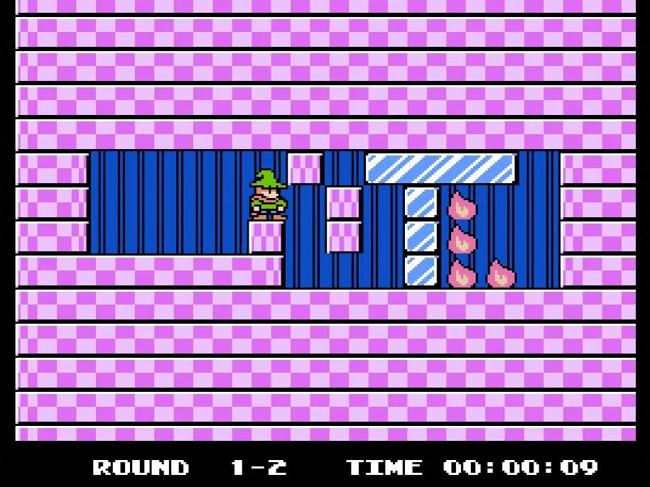Cảnh gameplay của Fire 'n Ice trên NES, thể hiện các khối băng và lửa trong một màn giải đố