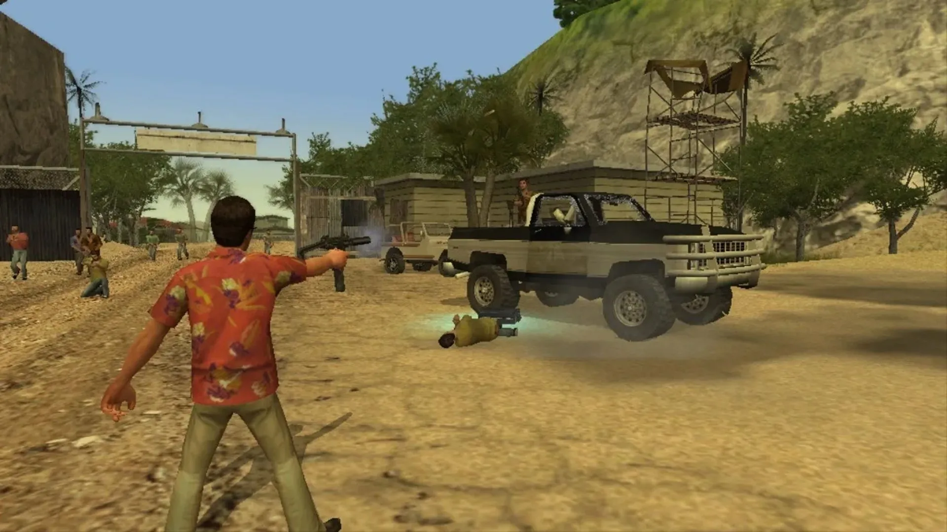 Cảnh gameplay của Scarface: The World is Yours với nhân vật Tony Montana đang đối đầu băng đảng trong một con hẻm, thể hiện yếu tố hành động và thế giới mở.