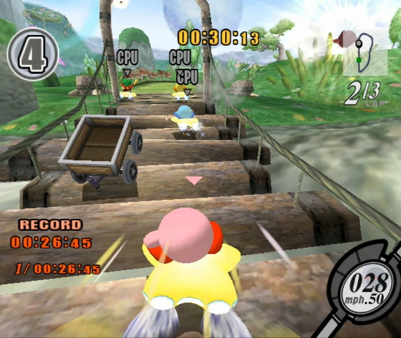 Cảnh gameplay trong Kirby Air Ride, Kirby đang lái xe qua một cây cầu gỗ, thể hiện đồ họa tươi sáng của game đua xe này.