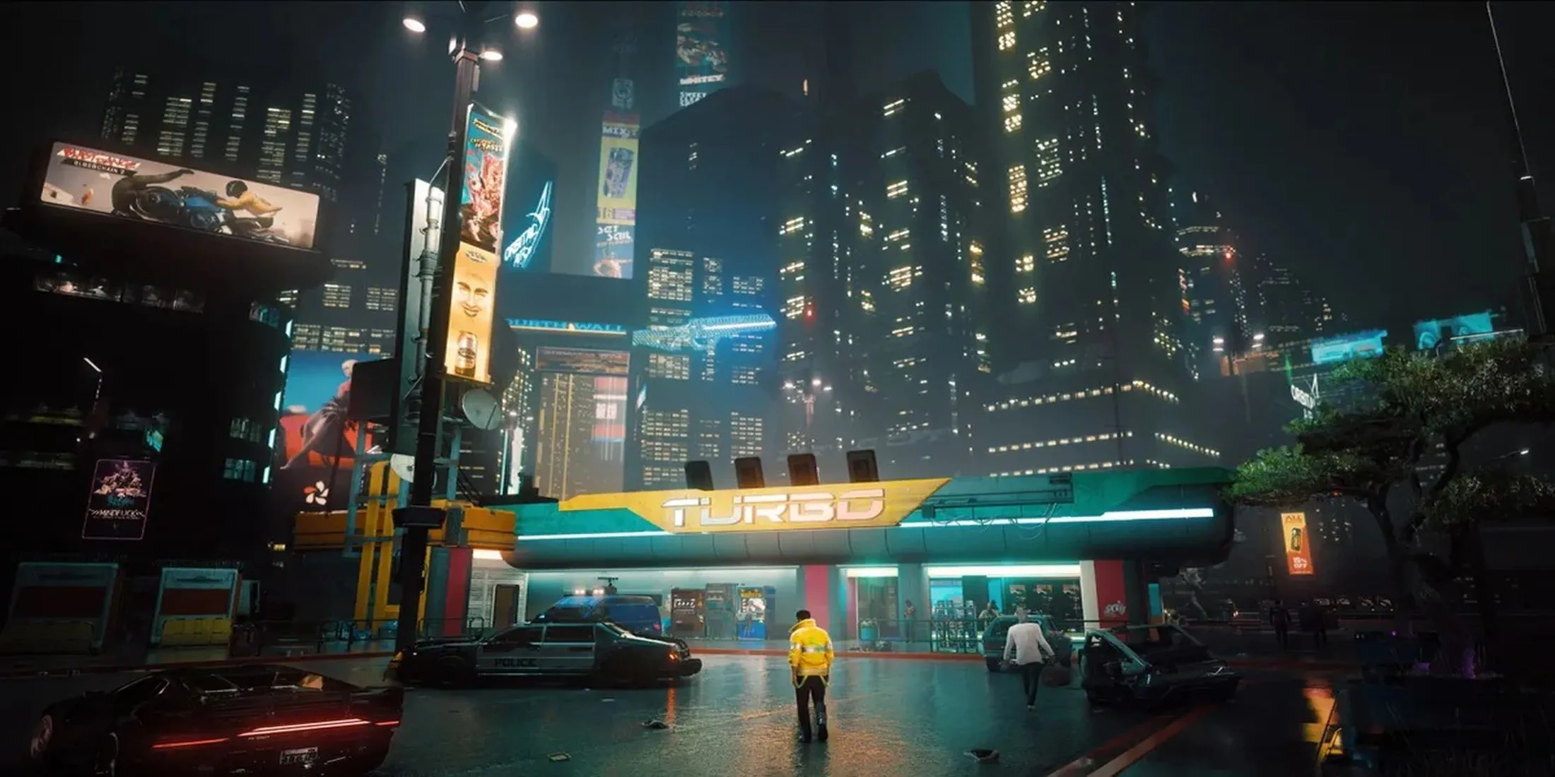 Cảnh Night City về đêm với các tòa nhà chọc trời và bảng hiệu neon chiếu sáng rực rỡ trong Cyberpunk 2077.