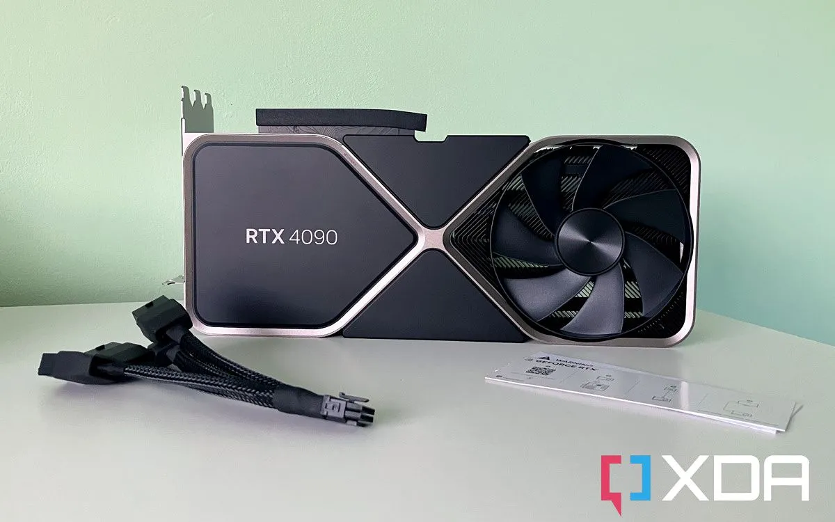 Card đồ họa NVIDIA RTX 4090 với các dây cáp nguồn, minh họa vấn đề tiềm ẩn với kết nối nguồn công suất cao trên GPU