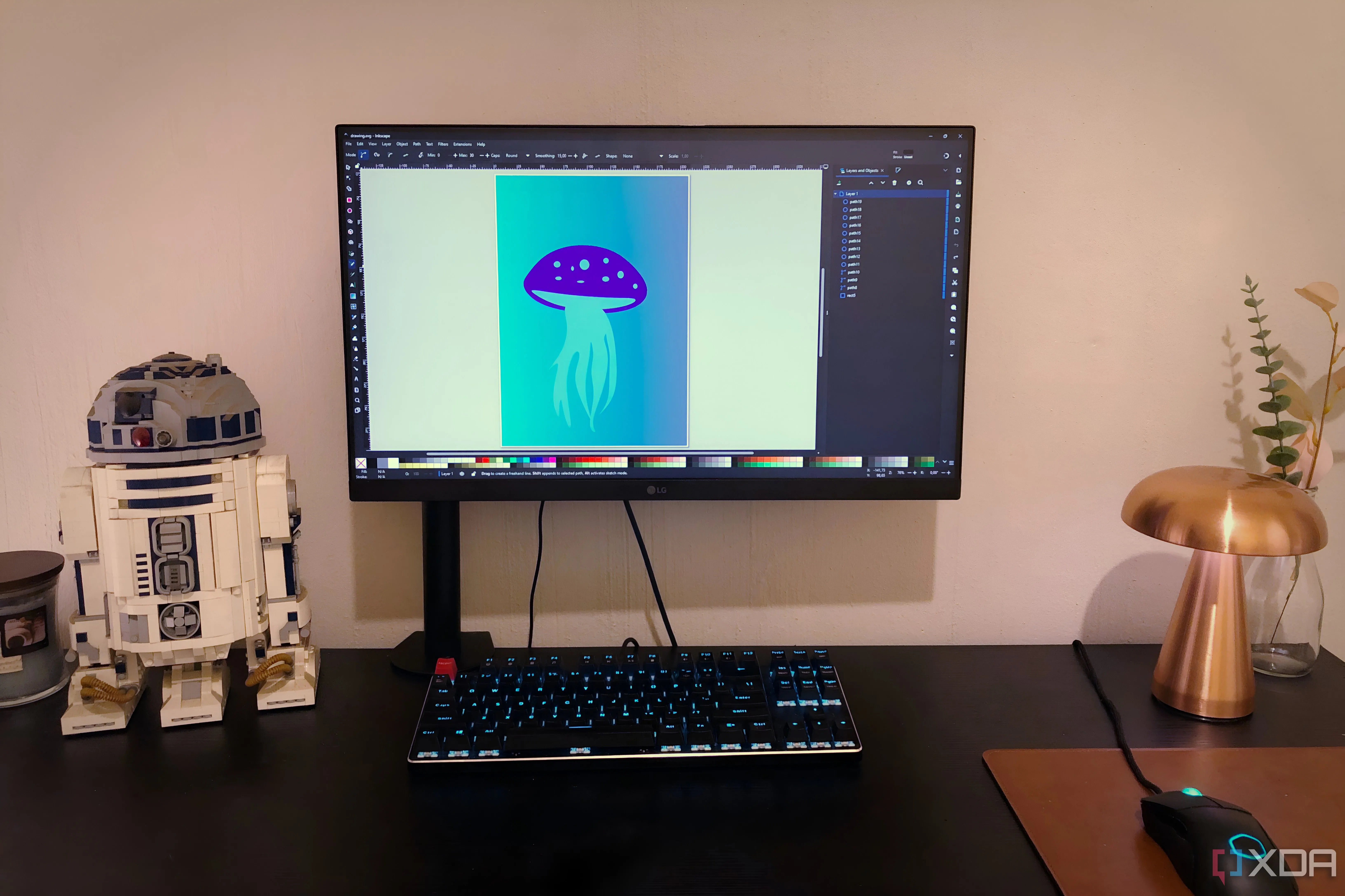 Hình minh họa sứa trong Inkscape hiển thị trên máy tính để bàn với Lego, đèn và cây cảnh