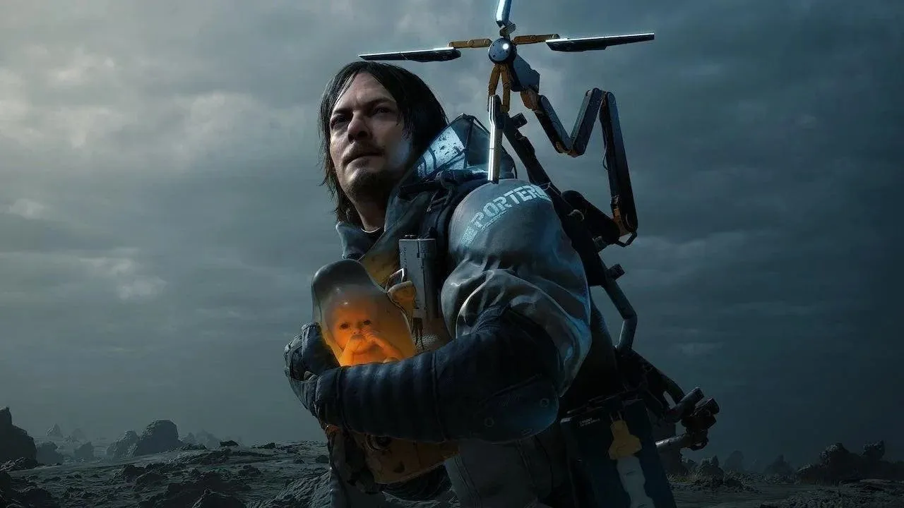 Key art của game Death Stranding với Sam Porter Bridges và Pod Baby (BB), biểu tượng của hành trình kết nối.