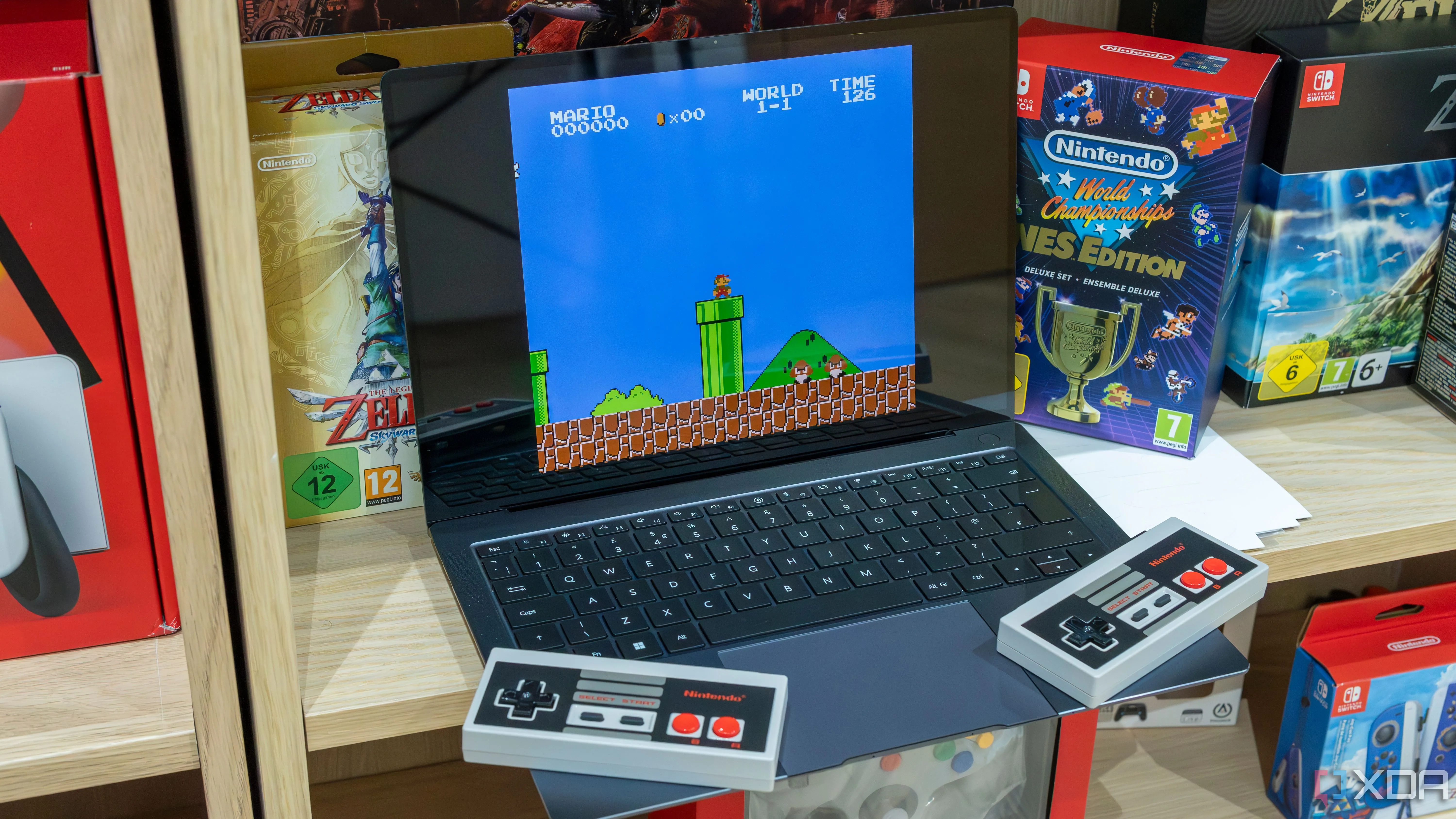 Laptop Windows 11 chạy giả lập Super Mario Bros với tay cầm NES