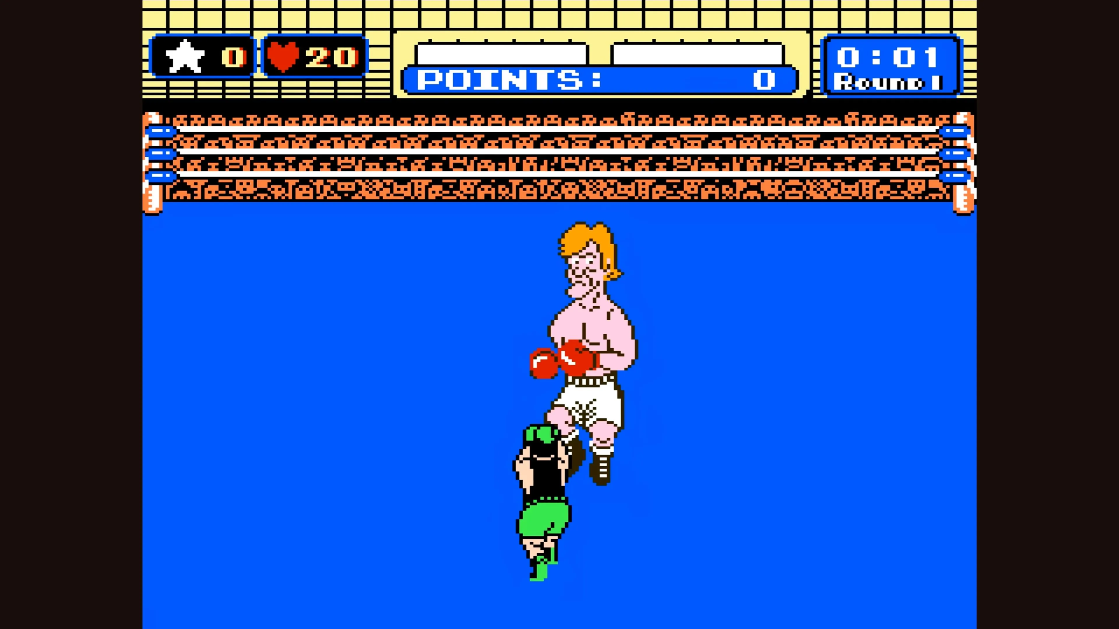 Little Mac đối đầu với đối thủ trong trận đấu boxing của Punch-Out!! trên NES