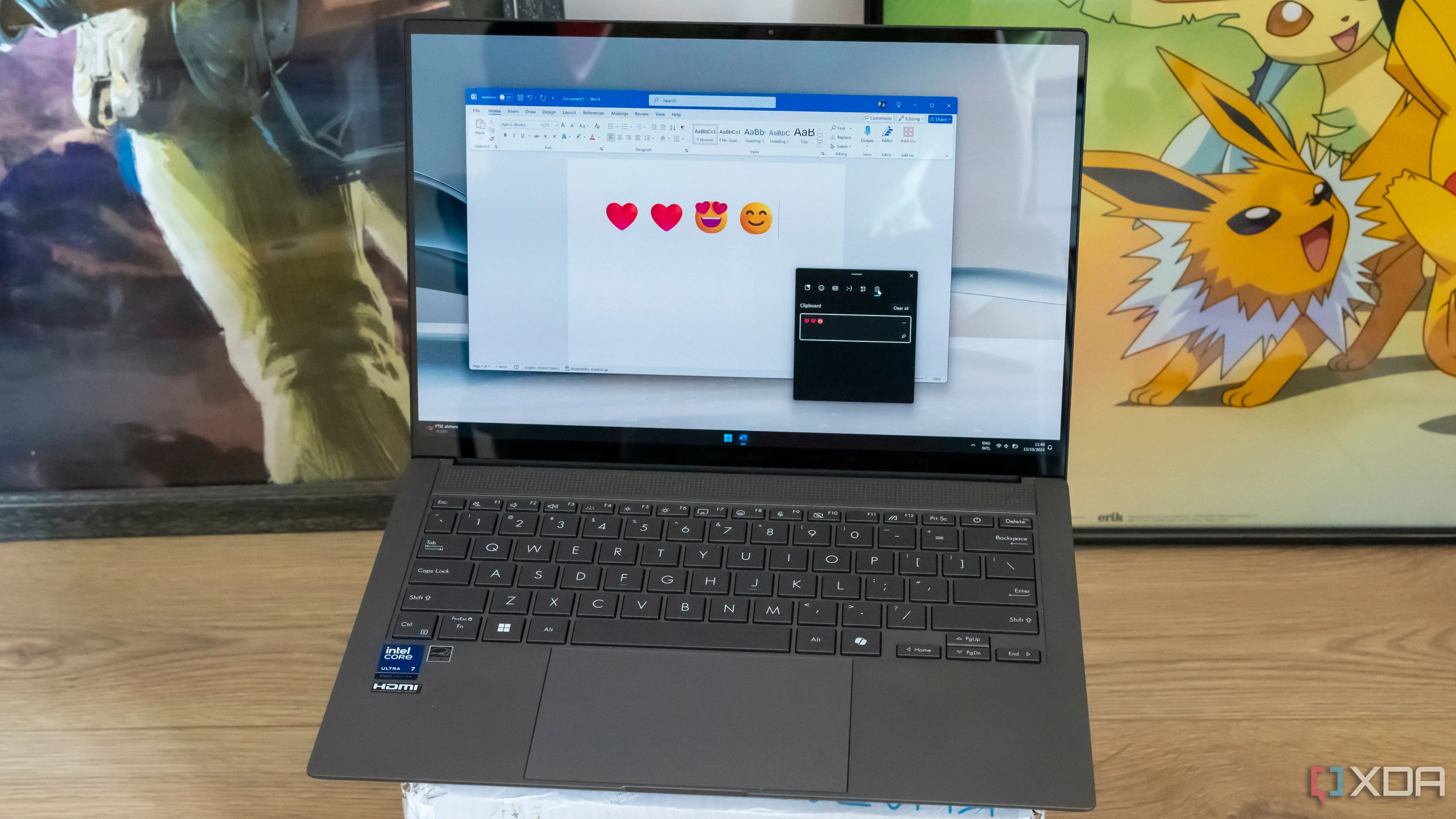 Màn hình laptop hiển thị Microsoft Word với bảng tính đang được chỉnh sửa và cửa sổ clipboard