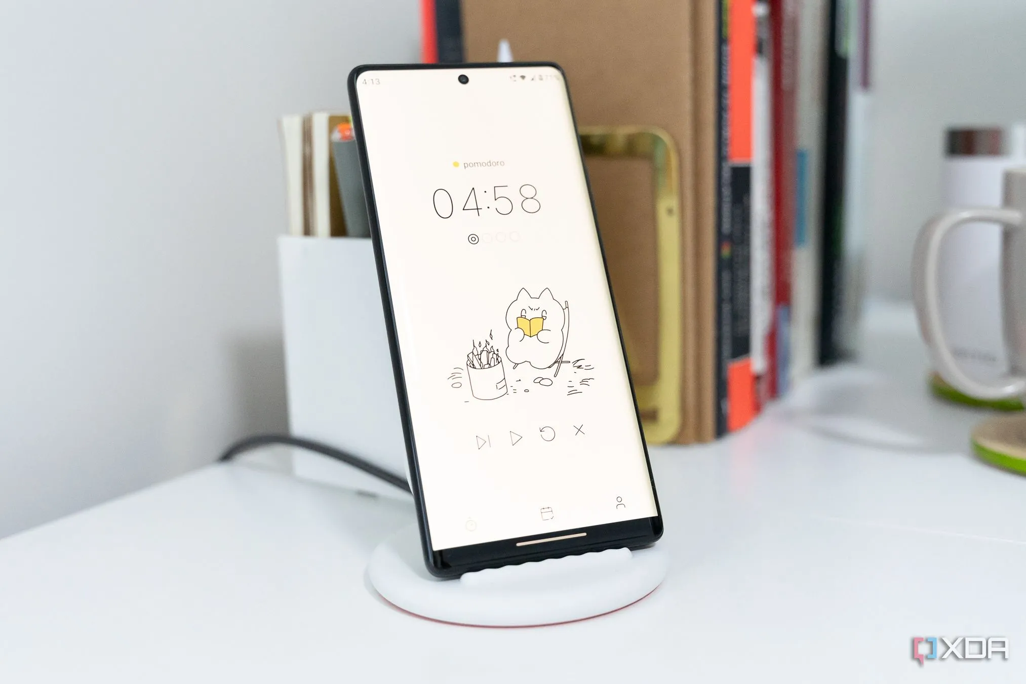 Màn hình ứng dụng Pomocat với hình ảnh mèo hoạt hình đang làm việc