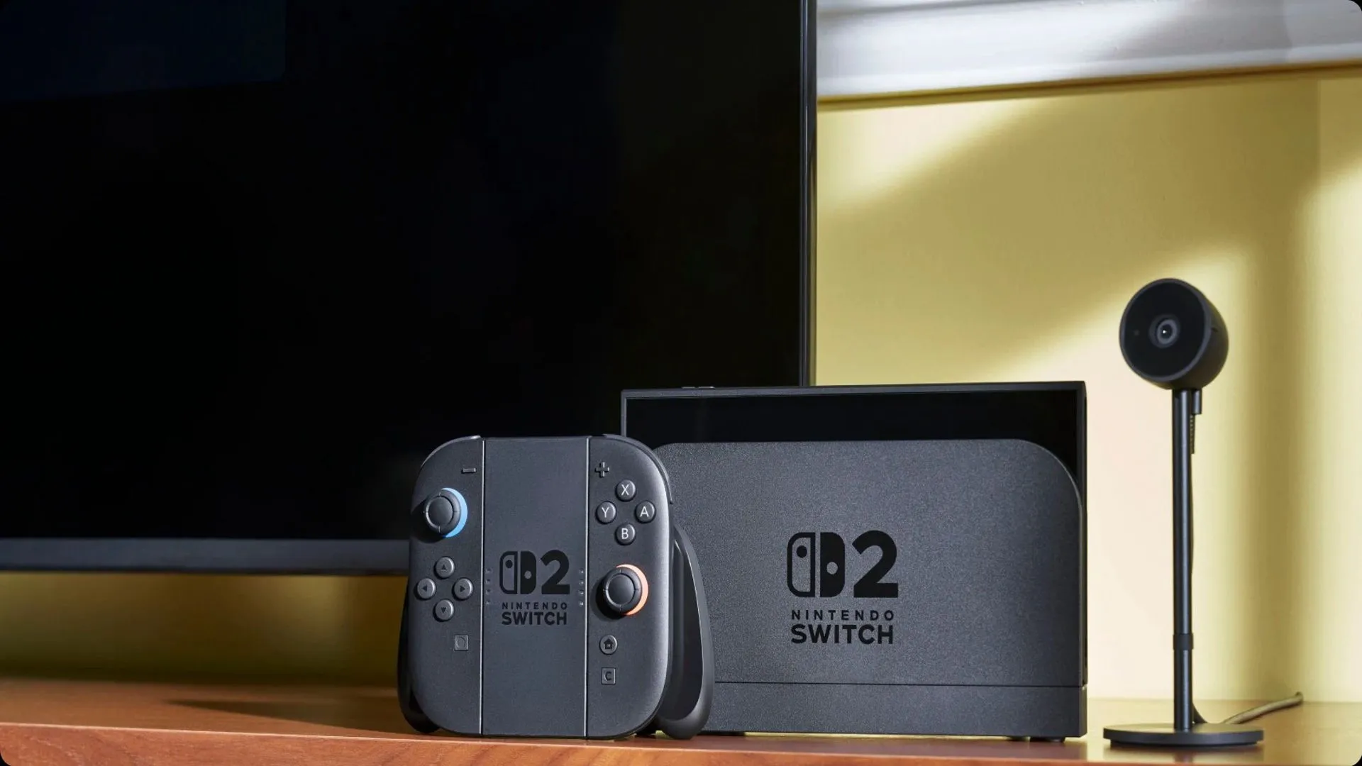 Máy chơi game Nintendo Switch 2 cùng bộ điều khiển và phụ kiện microphone, nhấn mạnh khả năng giao tiếp mới