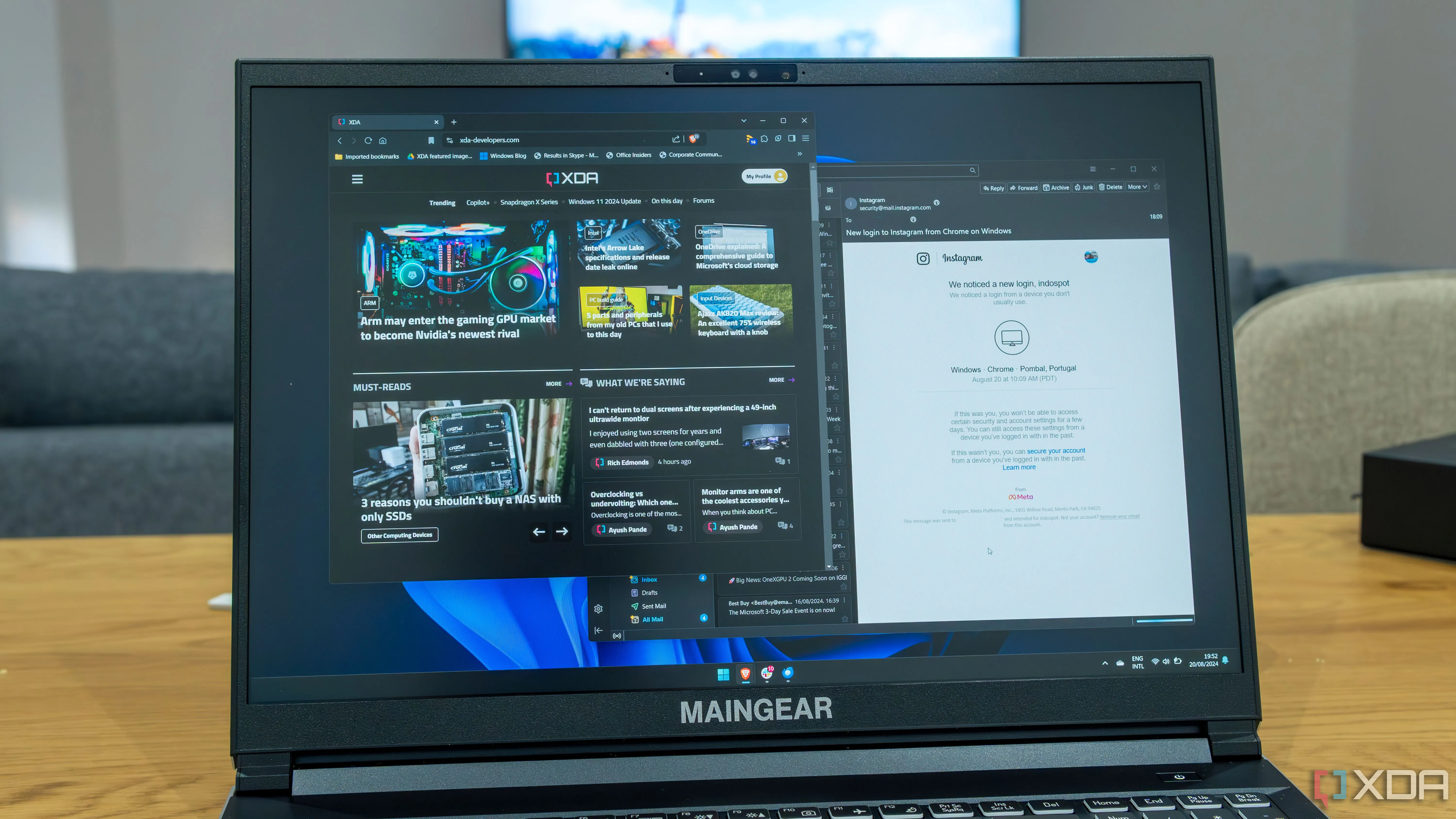 Máy tính xách tay Windows 11 đang chạy trình duyệt Brave và ứng dụng Mozilla Thunderbird