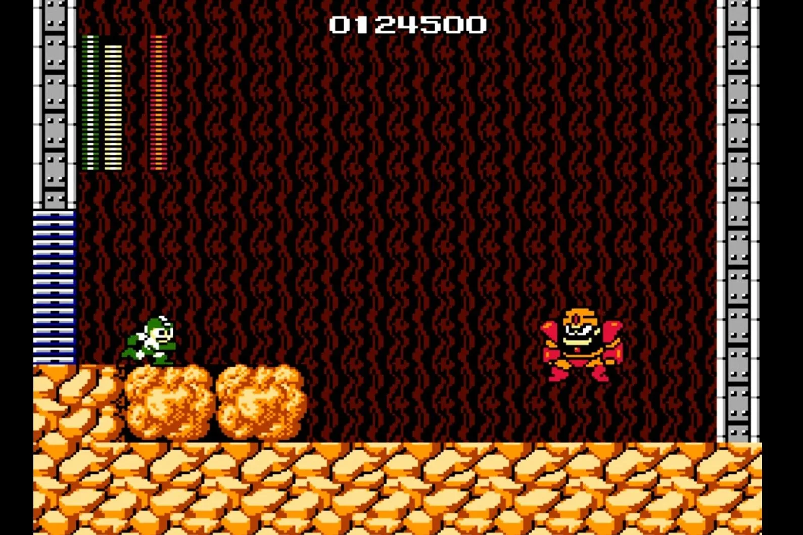 Mega Man đối đầu với một trong các boss robot trong game Mega Man trên NES, thể hiện lối chơi platformer hành động đầy thử thách.