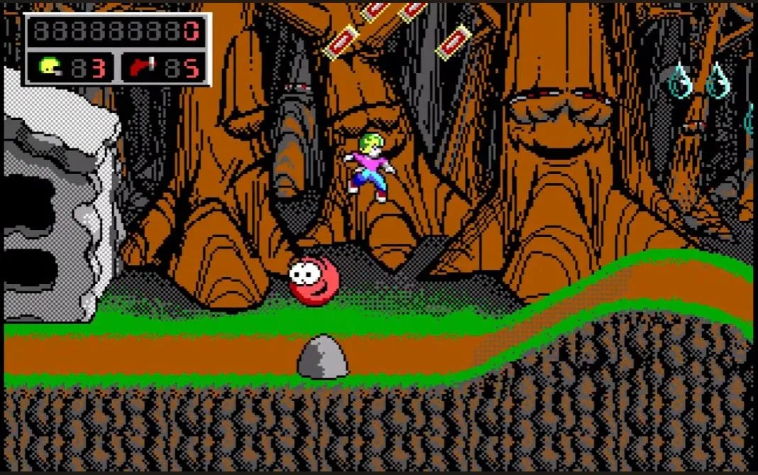 Một ảnh chụp màn hình từ cấp độ đầu tiên của Commander Keen 4, hiển thị nhân vật chính trên một nền địa hình ngoài hành tinh với kẻ thù và các vật phẩm để thu thập