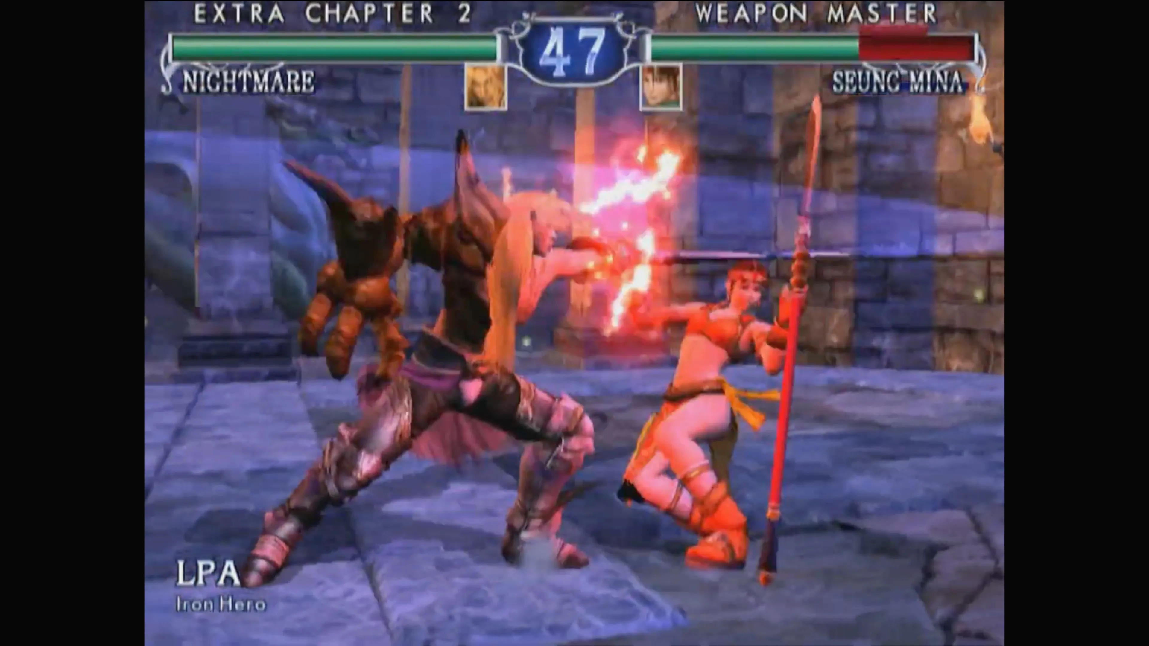 Một cảnh kết thúc trận đấu trong SoulCalibur II, nhân vật chiến thắng đang ăn mừng với tư thế biểu cảm.