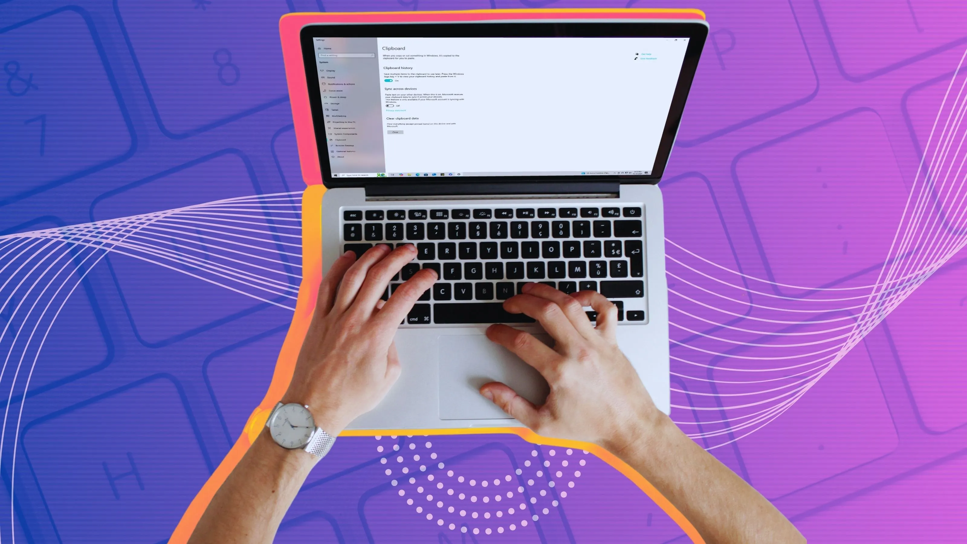 Người dùng đang gõ phím trên máy tính xách tay chạy Windows, liên quan đến việc sử dụng các công cụ làm việc và chia sẻ dữ liệu