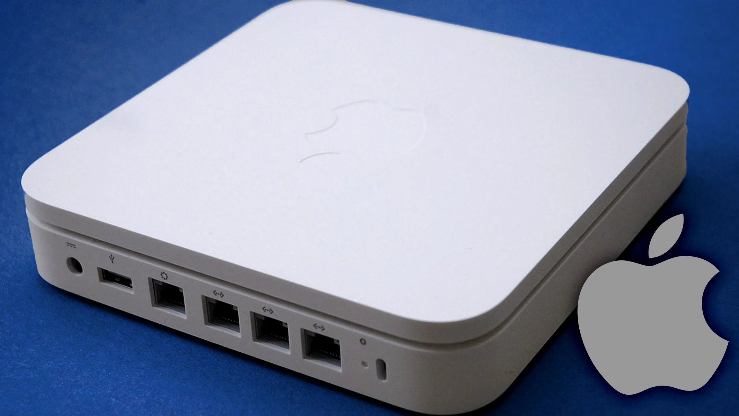 Router Apple Airport trên nền xanh tượng trưng cho kết nối mạng