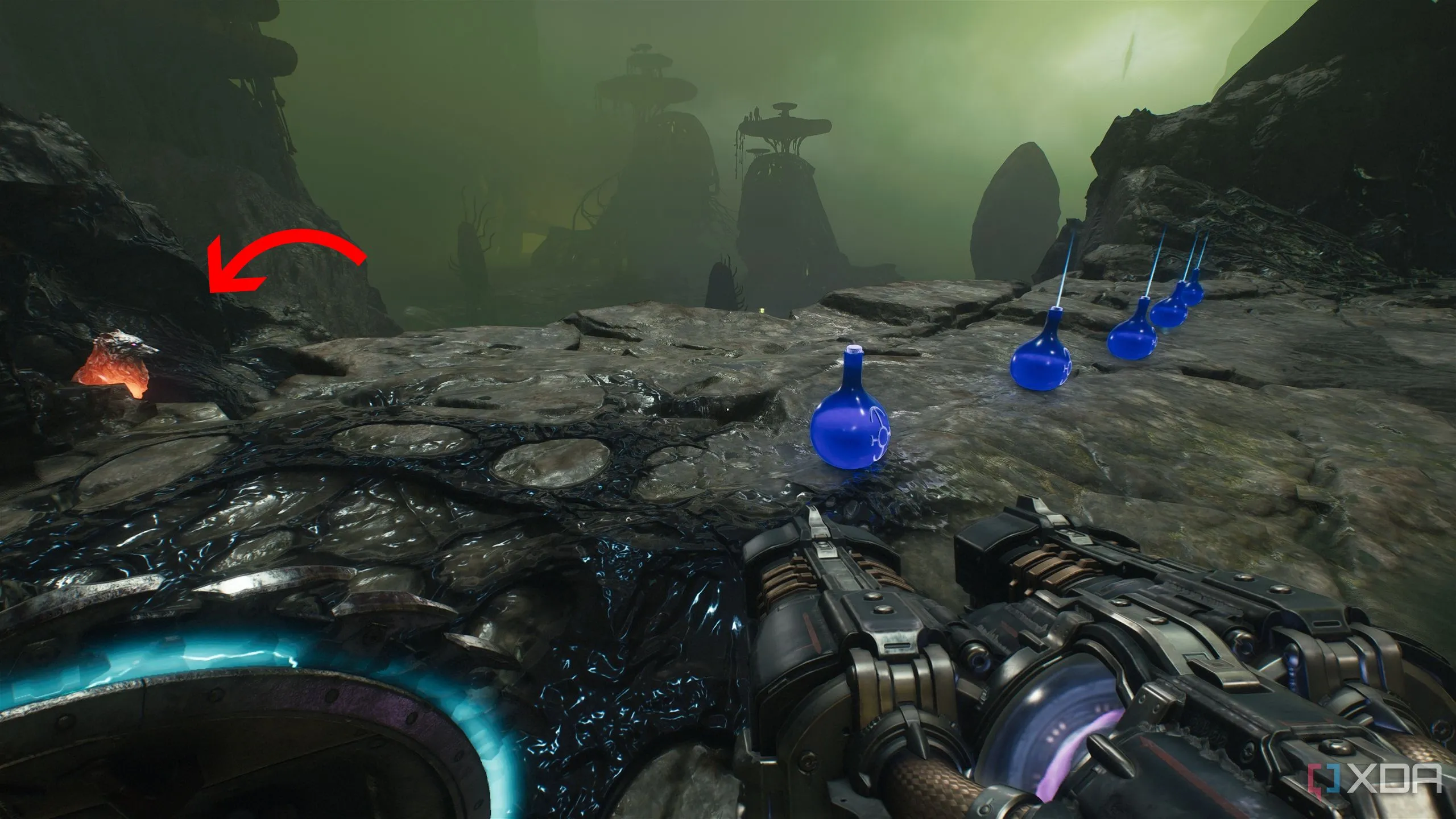 Tượng sói 4 ló ra sau hàng lọ máu dọc vách đá trong Chương 16 Doom: The Dark Ages.